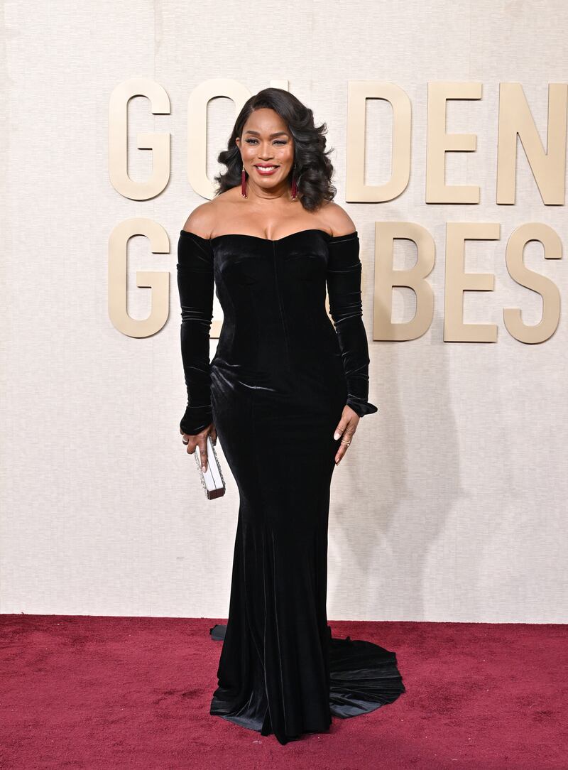 Angela Bassett attends the 81st Annual Golden Globe Awards wearing Dolce and Gabbana.