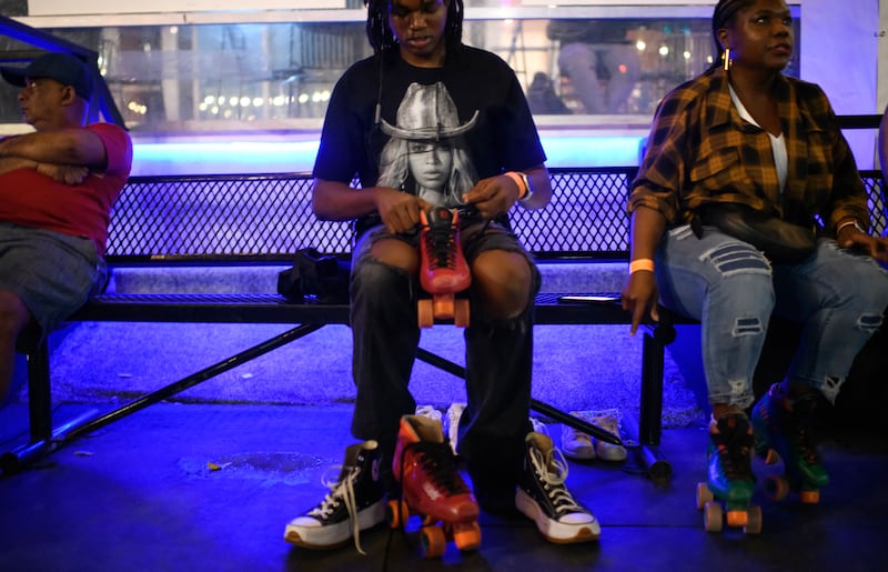 Beyonce's fans celebrate her album release at a roller rink listening party in her hometown of Houston, Texas.