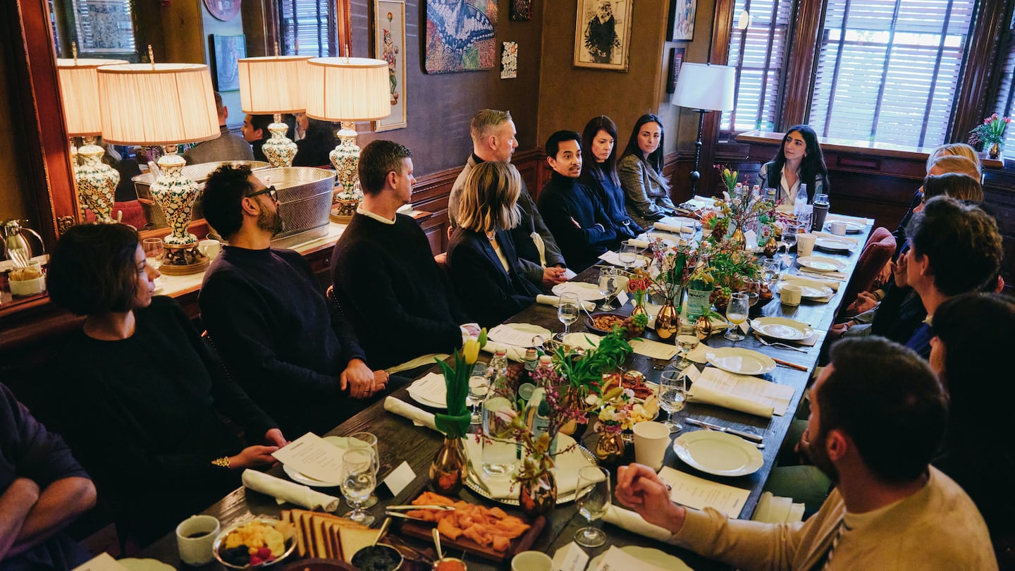 Industry executives sit at a table for a breakfast roundtable in New York on the topic 'Proving Long-Term ROI: How to Win C-Suite Support for Brand Investment'.